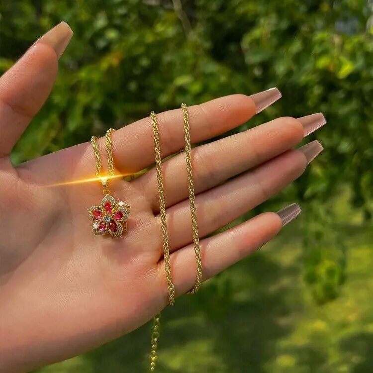 Collar Flor de Loto Rosa Giratorio