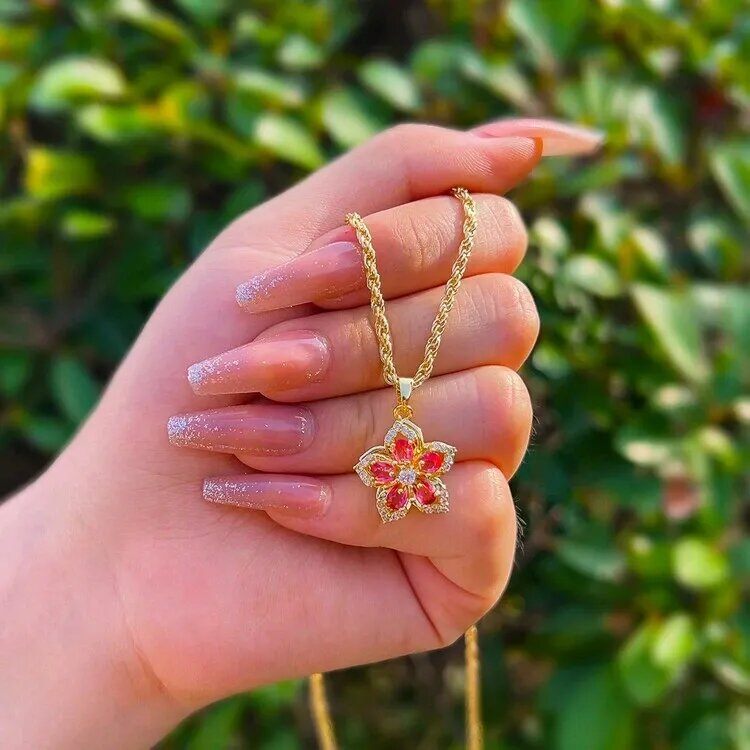 Collar Flor de Loto Rosa Giratorio